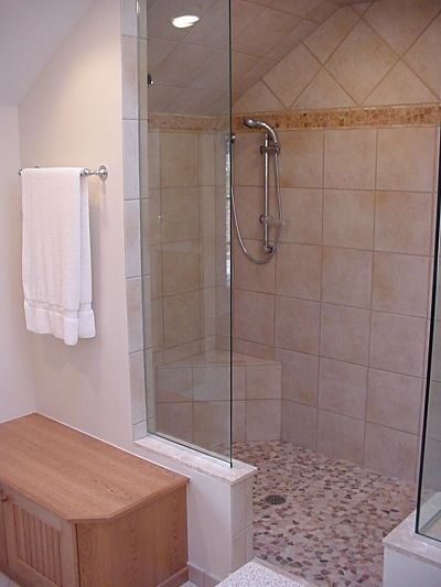 walk-in-shower-with-no-doors-and-corner-seat