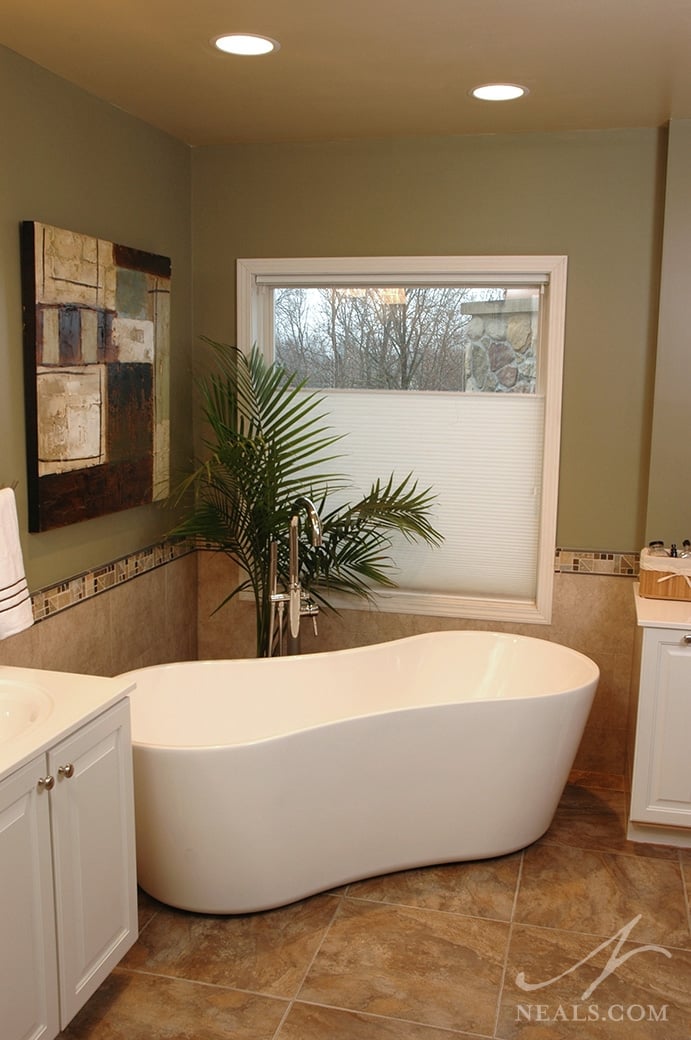 A solid base tub has a more modern and contemporary feel and, like this one, can come in many unique designs.
