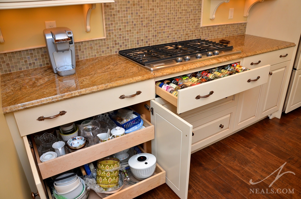 Custom gliding spice racks and shelves throughout your kitchen can make commonly used items more accessible.