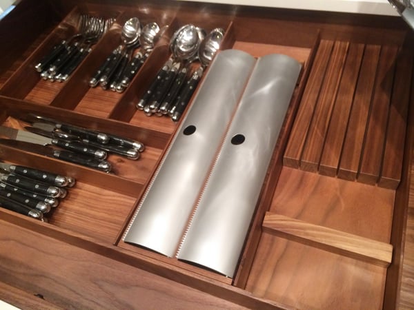 Walnut interiors can be used for any drawer or cabinet, making even your silverwear look amazing.