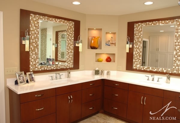 A different take on the double vanity, two contemporary vanities come together in the corner of this master bath, giving both users ample space and storage.