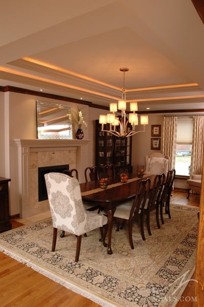 A rectangular tray ceiling in the dining room offers interest and a place for additional, unobstrusive lighting.