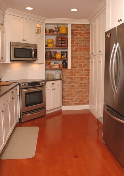 The brick in this Hyde Park kitchen was revealed and restored during the remodel.