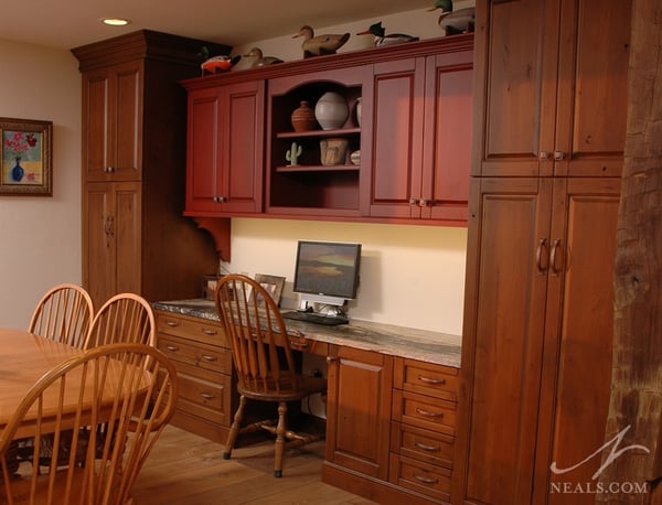 Ready for summer fun, this home office in the dining room is clear of clutter.