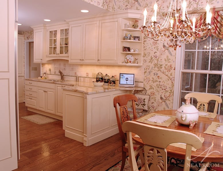 A chinoiserie style wallpaper in this Neal's kitchen and breakfast room play off the homeowner's collections and eclectic style.