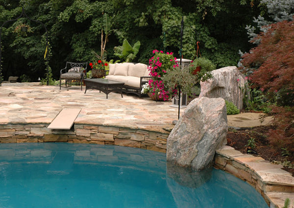 pool with boulder accent