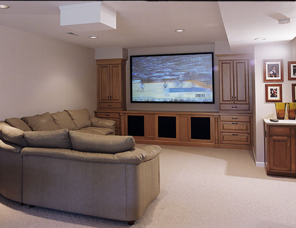 basement home theater with front projector screen