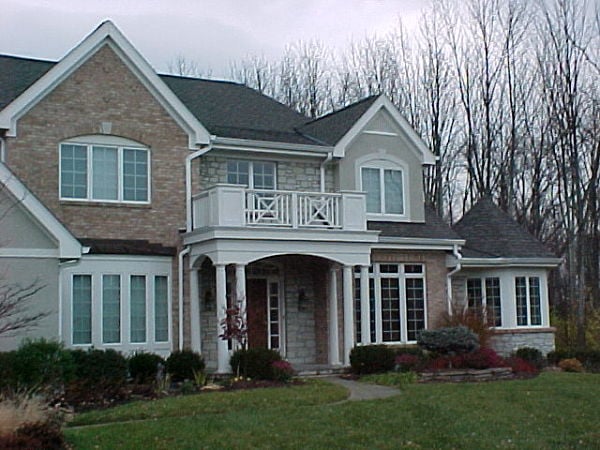 country french home with portico