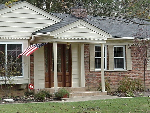 Federalist style home with portico