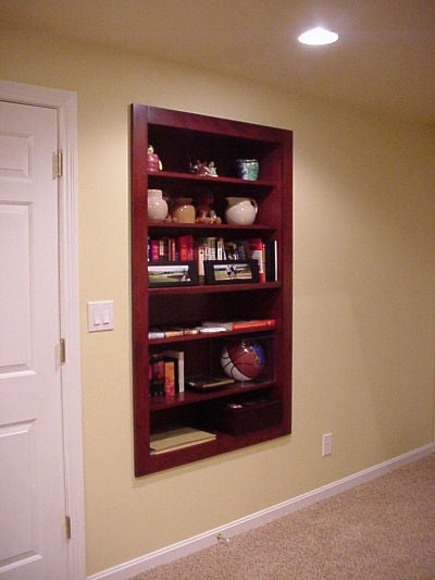 large wood framed wall niche