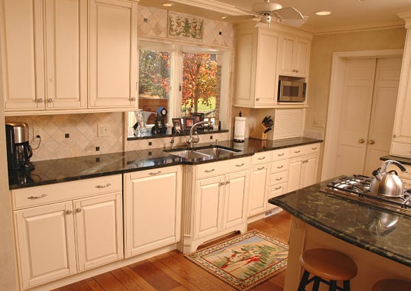 kitchen with raised panel cabinets and granite counters