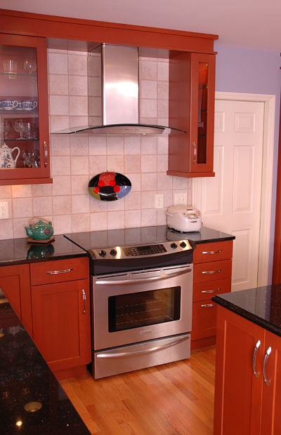 transitional kitchen with sculptural hood