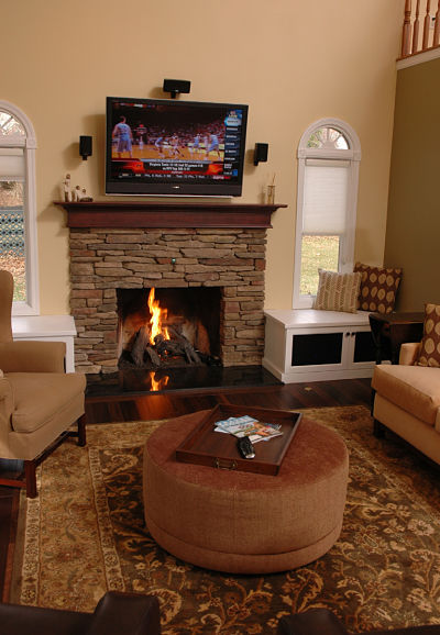 two window seats frame a fireplace