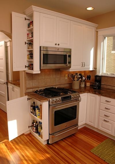 narrow kitchen cabinets provide ample storage for small items