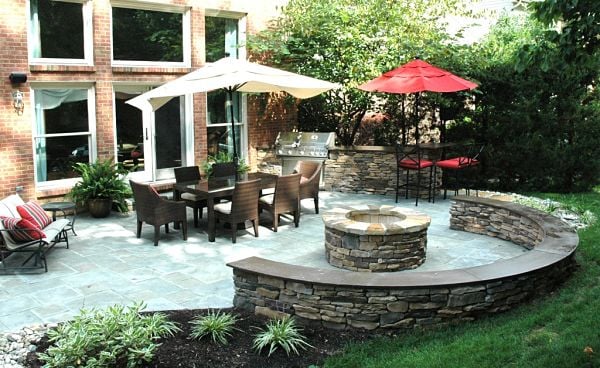 patio with outdoor kitchen and firepit