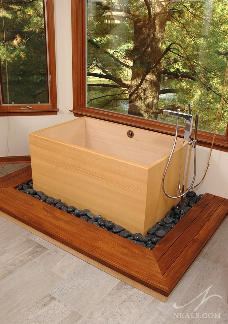 This Japanese-style soaker tub made from Hinoki wood brings a natural feel to this relaxation oasis.