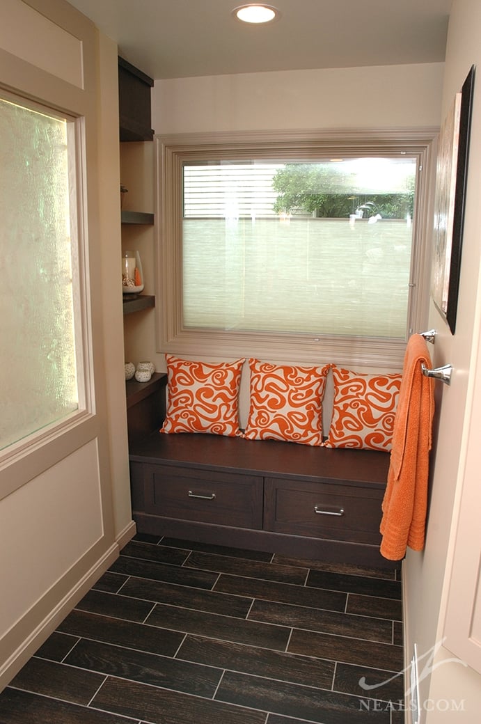 A recent Neal’s master bath featuring a glazed porcelain tile floor looks like wood. American Naturals-Black Rock was used.