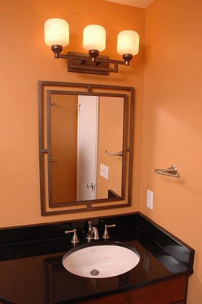 Half Bath with Elegant Mirror