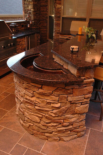 outdoor kitchen with crescent moon shaped sink
