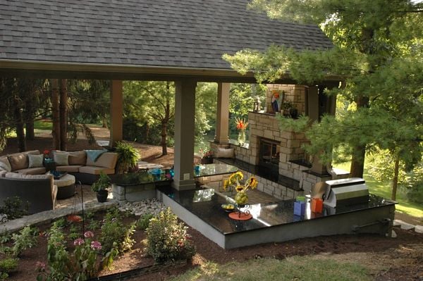 outdoor room with kitchen and fireplace