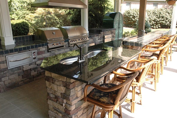 outdoor kitchen and seating area