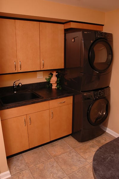 basement laundry area and cabinets