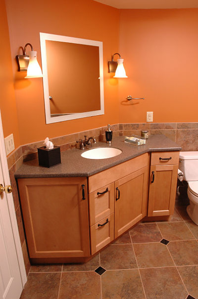 basement bathroom with large vanity sink