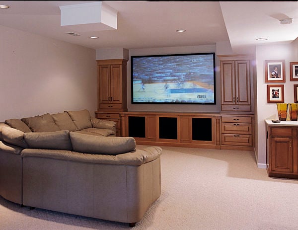 basement home theater with front projector screen