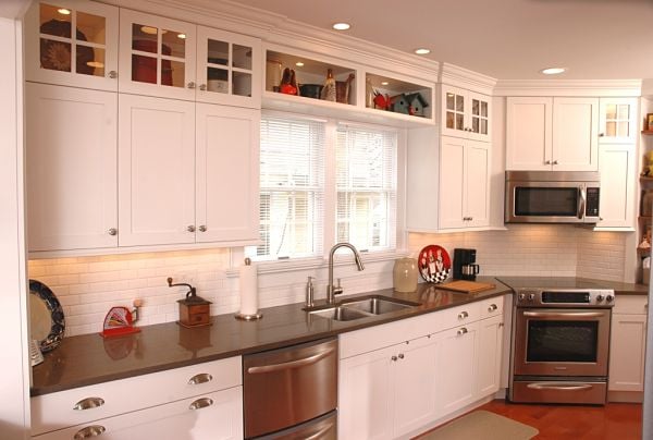 galley kitchen with shaker style cabinets