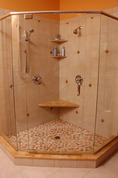 neo-angle walk-in shower with custom glass surround