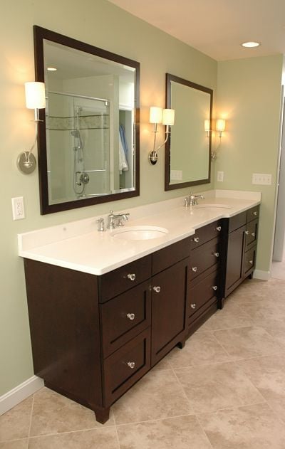 vanity with two sinks and mirrors