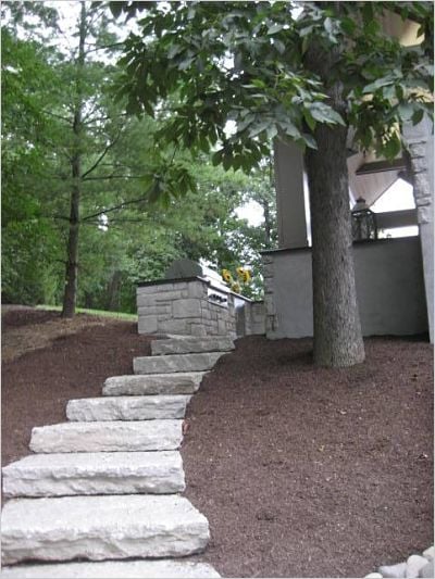 stone stairway to backyard pavilion