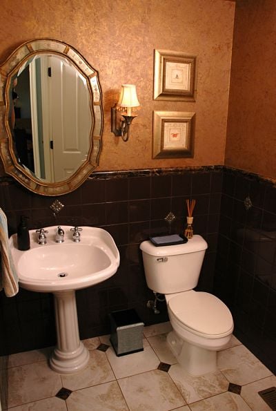 half bath with pedestal sink and comfort height toilet