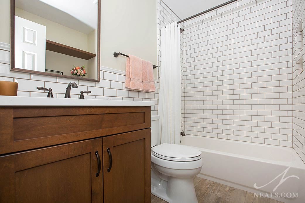 Subway tile features heavily in this hall bathroom in Loveland.