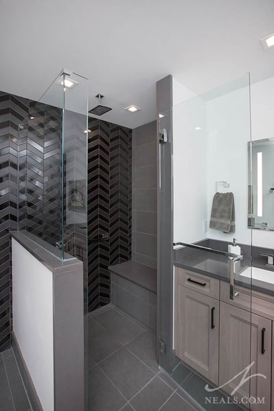 A rain showerhead in a contemporary bathroom in Evendale.