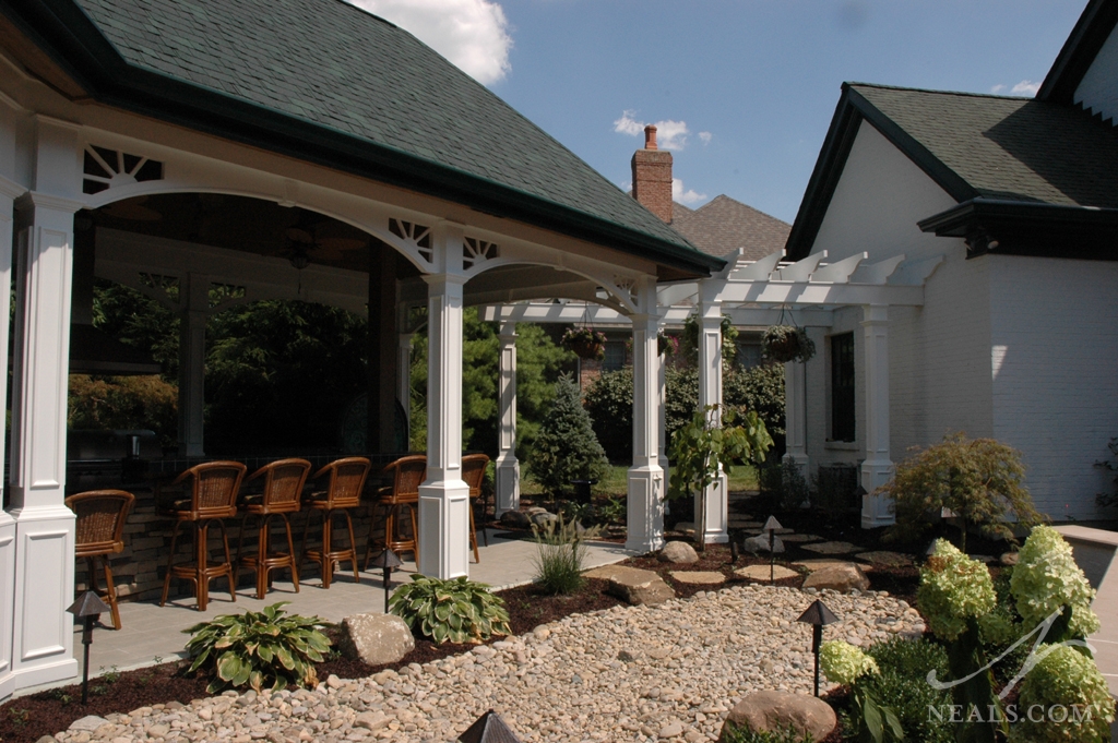 A Pergola connects this Mason veranda project to the main house.