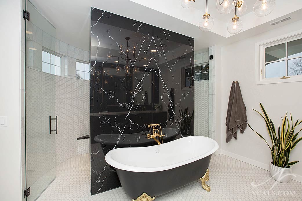 Modern-styled clawfoot tub in Indian Hill master suite remodel.