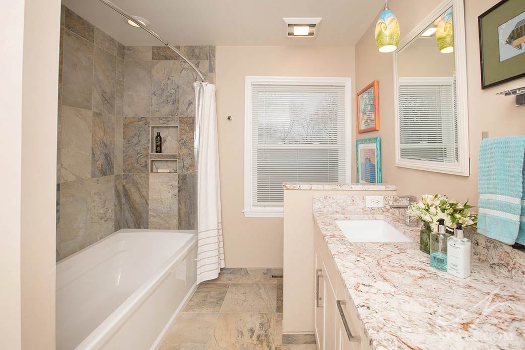 Apron-front tub in a Anderson Township hall bath remodel.