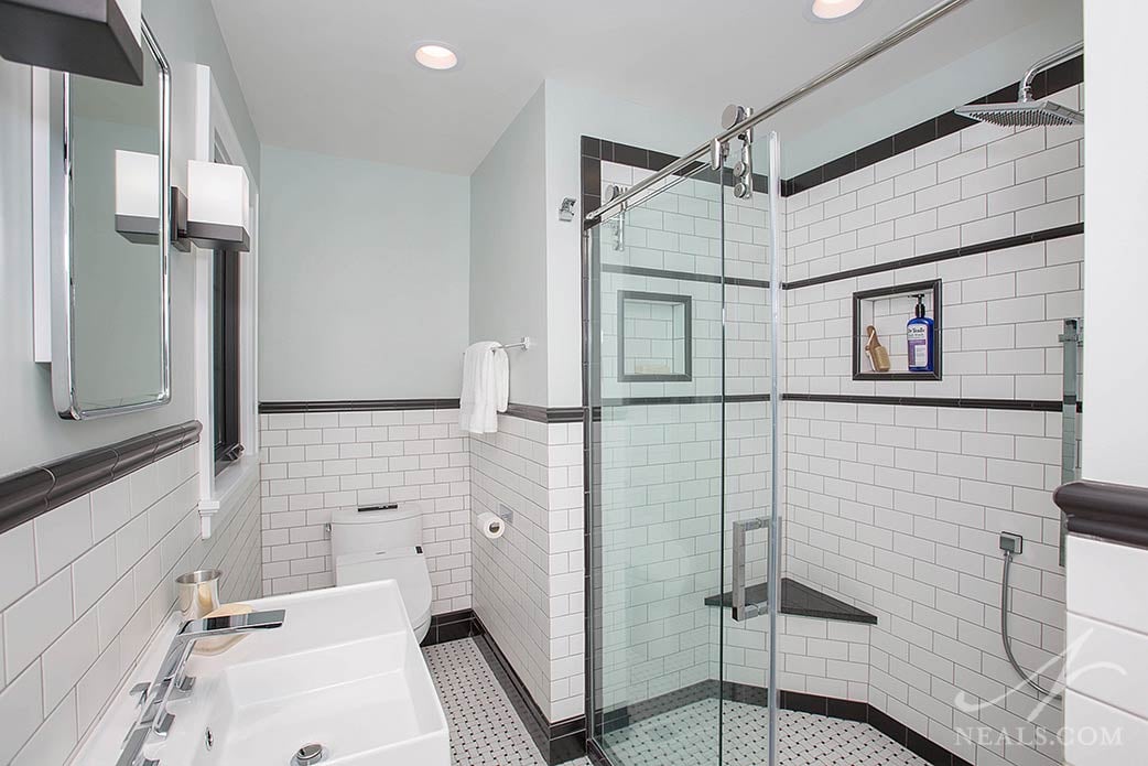 traditional shower with contrasting tile