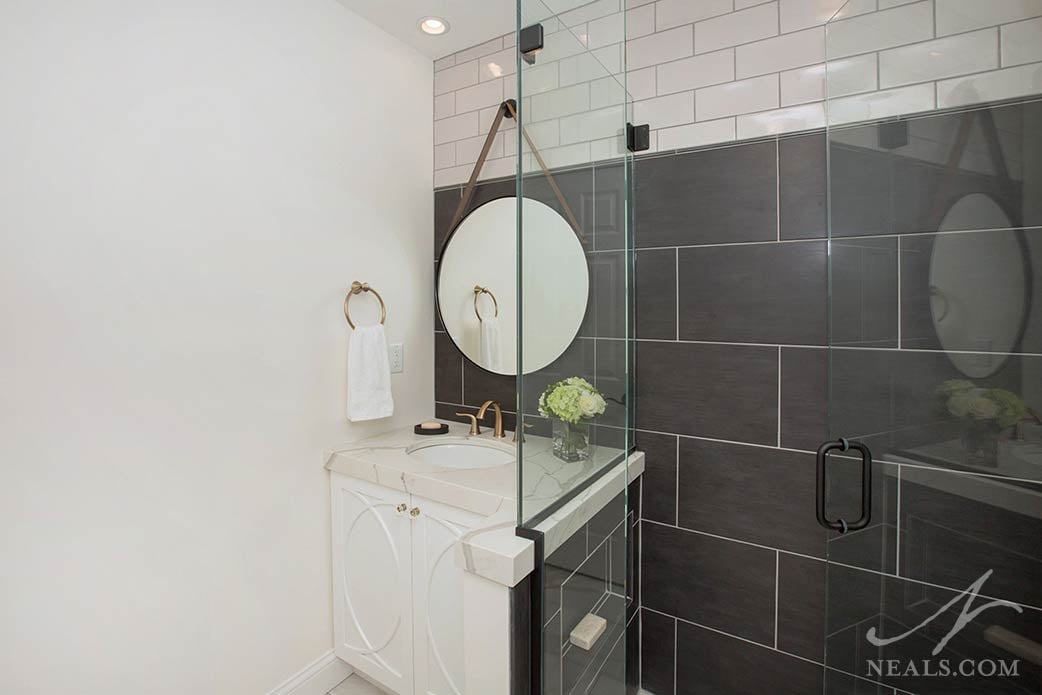 round mirror in bathroom