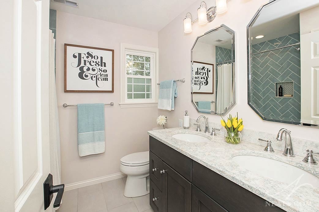 guest bathroom with two sinks