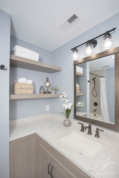 bathroom with open shelving at the vanity