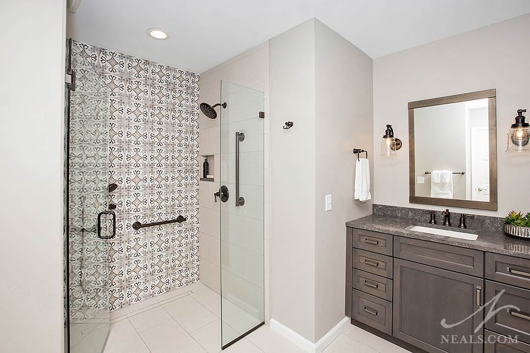 printed tile in the shower in a transitional bathroom