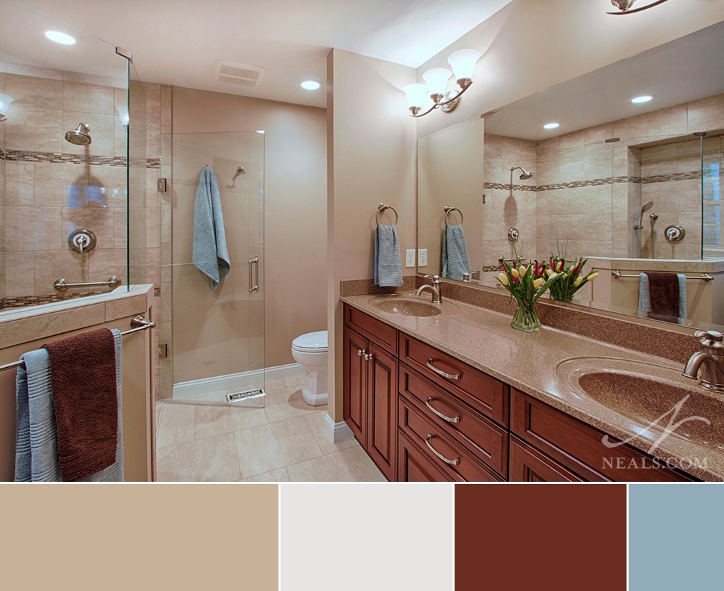 Master Bathroom utilizing a low-contrast neutral palette that allows the contrasting vanity to be a focal point.