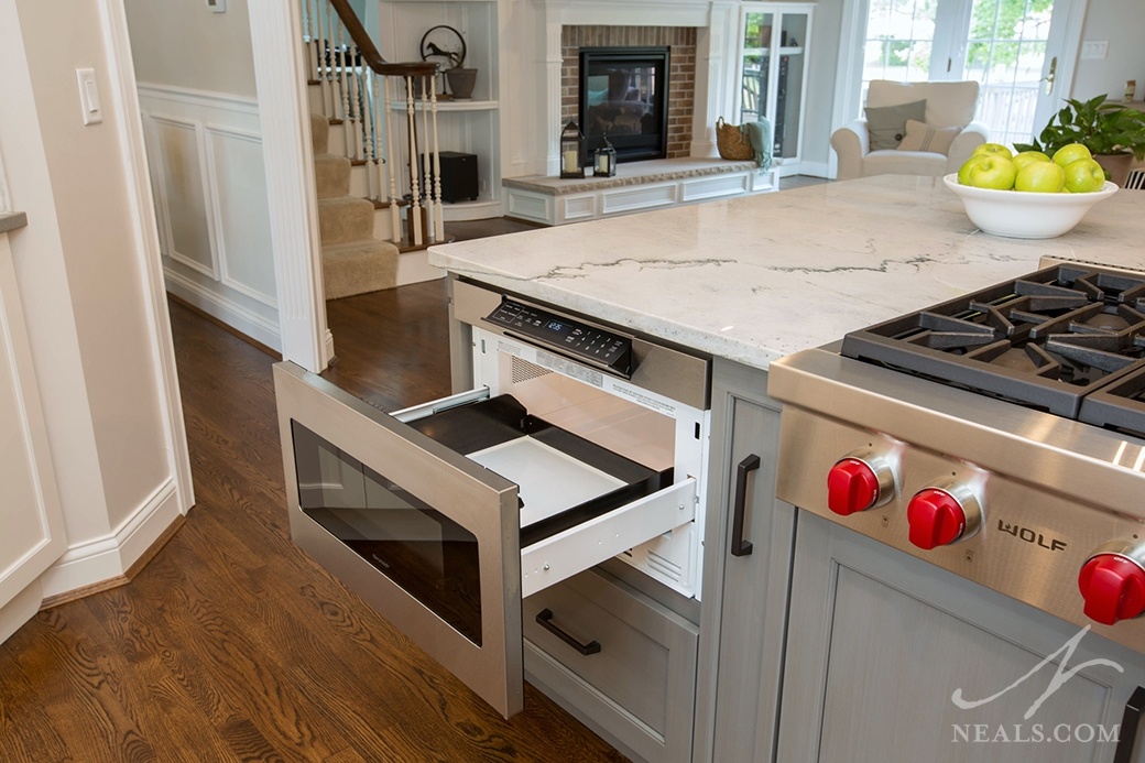 In this Loveland kitchen, the standard microwave was replaced with a microwave drawer placed in the island for easy access by all members of the family.