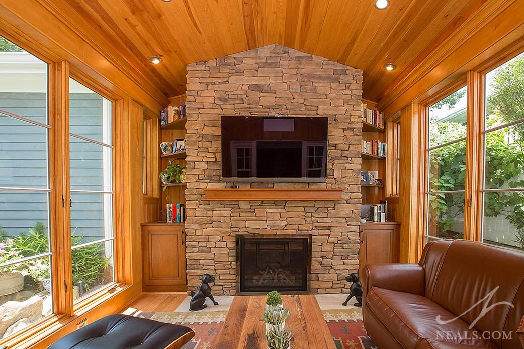 fireplace in sunroom addition in Madeira