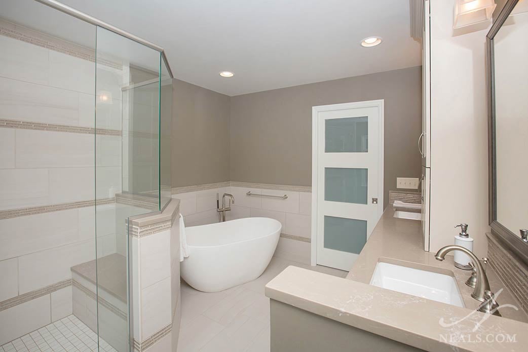 Modern and minimalist free-standing tub in Loveland bathroom remodel.