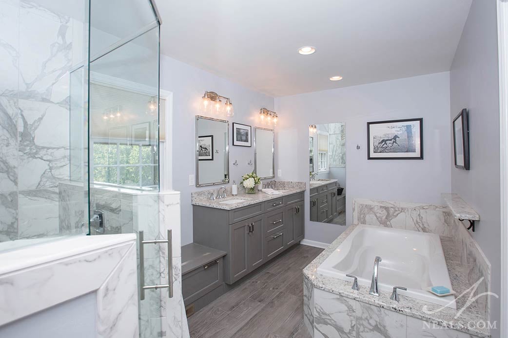 A deck style tub with a tile surround in an Anderson Township remodel.