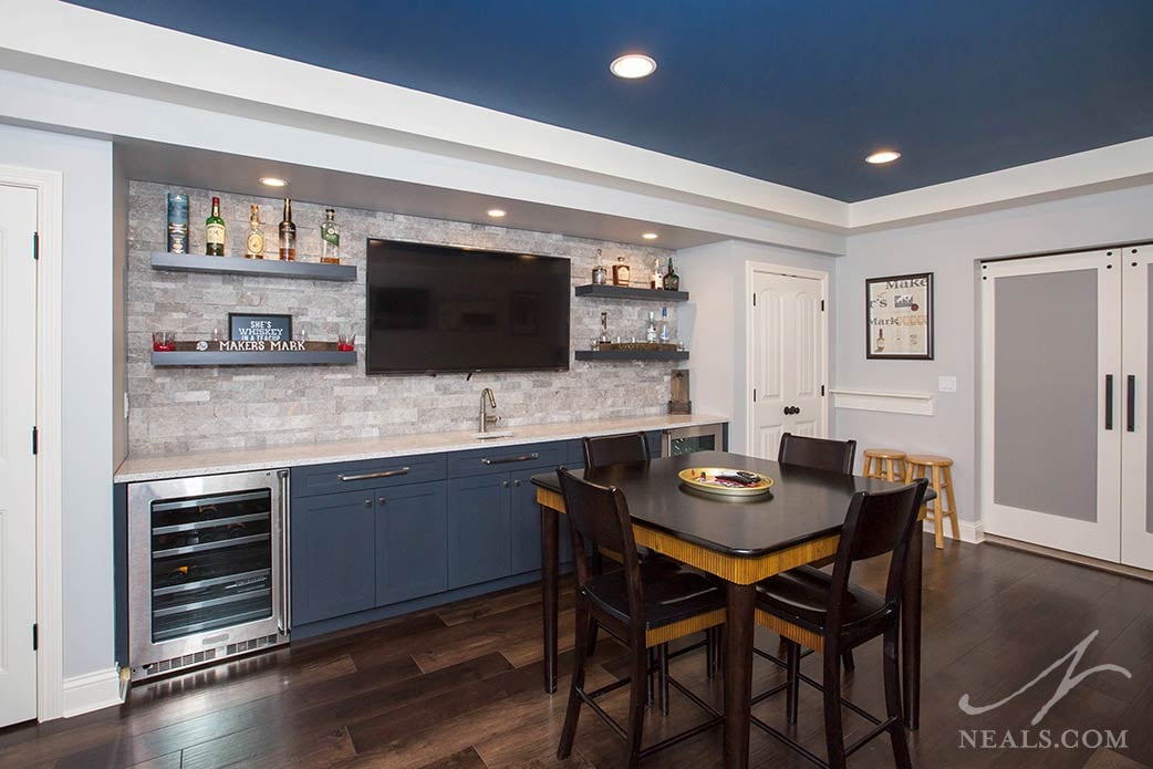basement with blue cabinetry