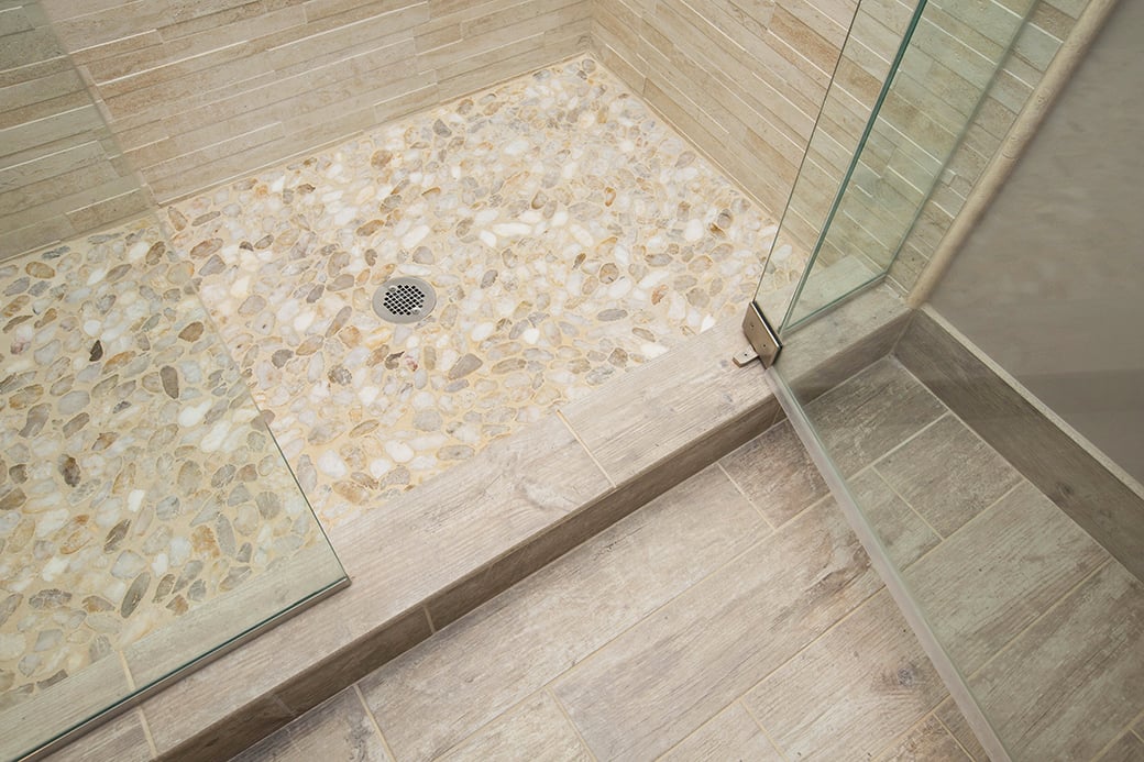 A mixture of coordinating tile options in this Montgomery bathroom.